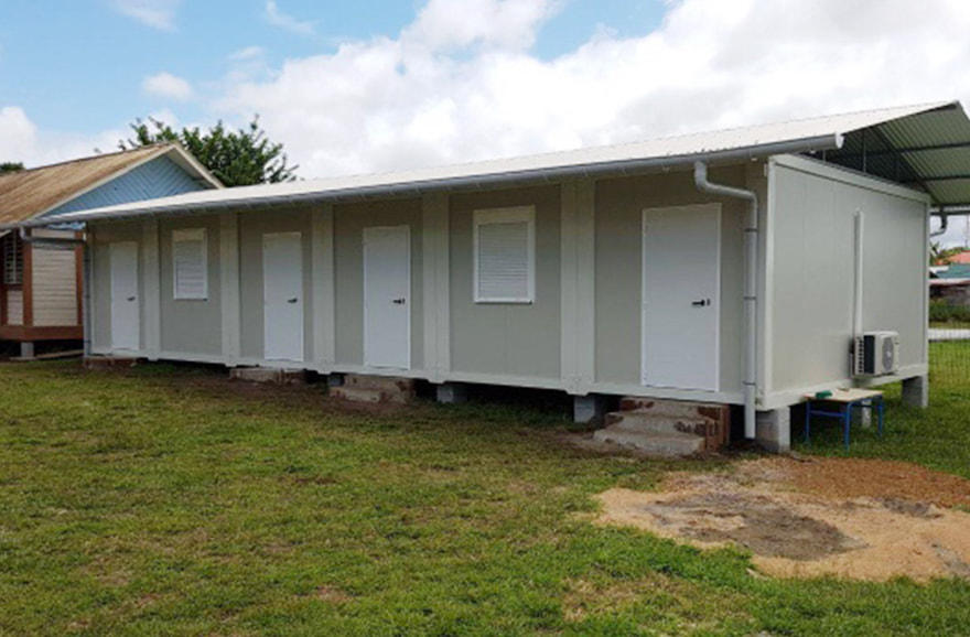 French Guiana container classroom with side toilet